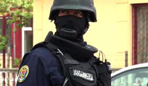 Jandarm bătut în timpul unei percheziţii în Argeş, la o grupare de skimmeri