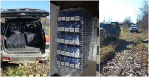 Zeci de mii de pachete cu ţigări şi sume mari de bani, găsite de poliţiştii de frontieră din Maramureş în urma unor descinderi la contrabandişti