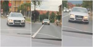 Șoferul unui Audi stârnește uluire pe un drum din Negrești Oaș, în Satu Mare: "Ăsta o fumat ceva cred...uite, și cu poliția acolo! E de necrezut"