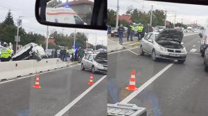 Accident pe DN 1, la Romăneşti. O mașină a ajuns pe contrasens, alta a rămas suspendată pe parapet