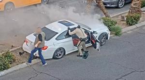 Polițist filmat cum scoate un șofer dintr-un BMW, cu câteva secunde înainte ca bolidul să ia foc. Salvare dramatică pe un bulevard din Las Vegas