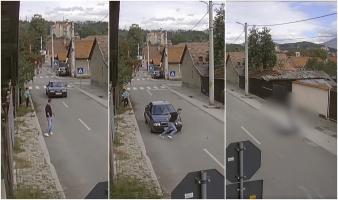 Momentul teribil în care un șofer izbește intenţionat cu maşina un bărbat, pe o stradă din Petroşani. Cei doi s-ar fi certat înainte din cauza copiilor lor