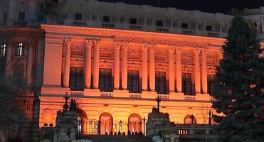 Clădiri din România, îmbrăcate în portocaliu, de Ziua Mondială a Luptei împotriva Cancerului. Boala cruntă este a doua cauză majoră de deces din lume