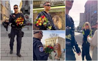 Jandarmul Vlad loveşte din nou. De 1 Martie, chipeşul ofiţer a împărţit flori doamnelor şi domnişoarelor pe străzile din centrul Capitalei