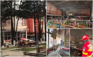 Magazin alimentar în flăcări, în centrul orașului Cavnic. O ladă frigorifică ar fi declanşat dezastrul