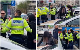 Momentul când o femeie este încătușată chiar în fața Guvernului, după un scandal în trafic. Oamenii legii au găsit în mașină 50 de bile de cauciuc